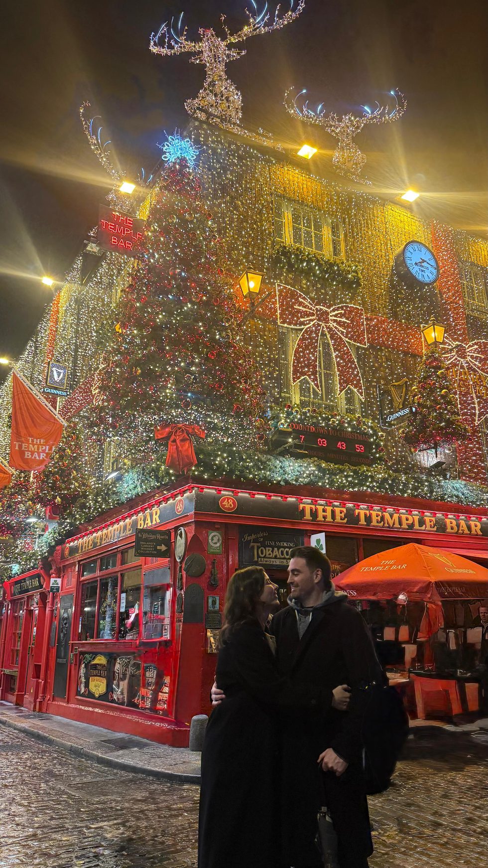 Jack and Niamh outside The Temple Bar at Christmas