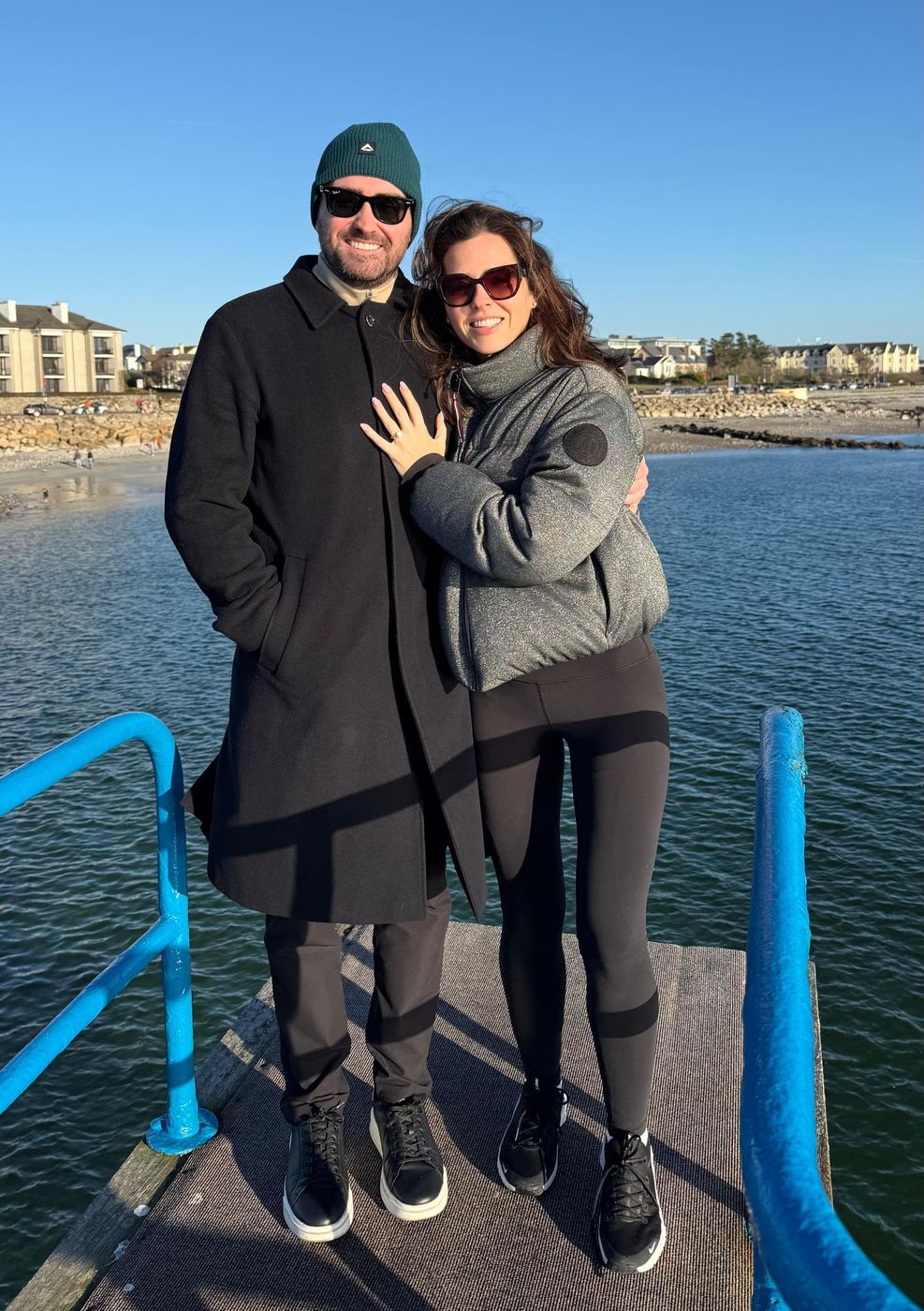 Jack and Niamh on a seaside pier